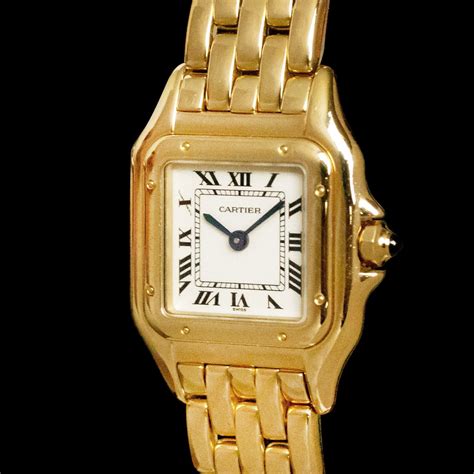 ladies cartier panthere gold watch.